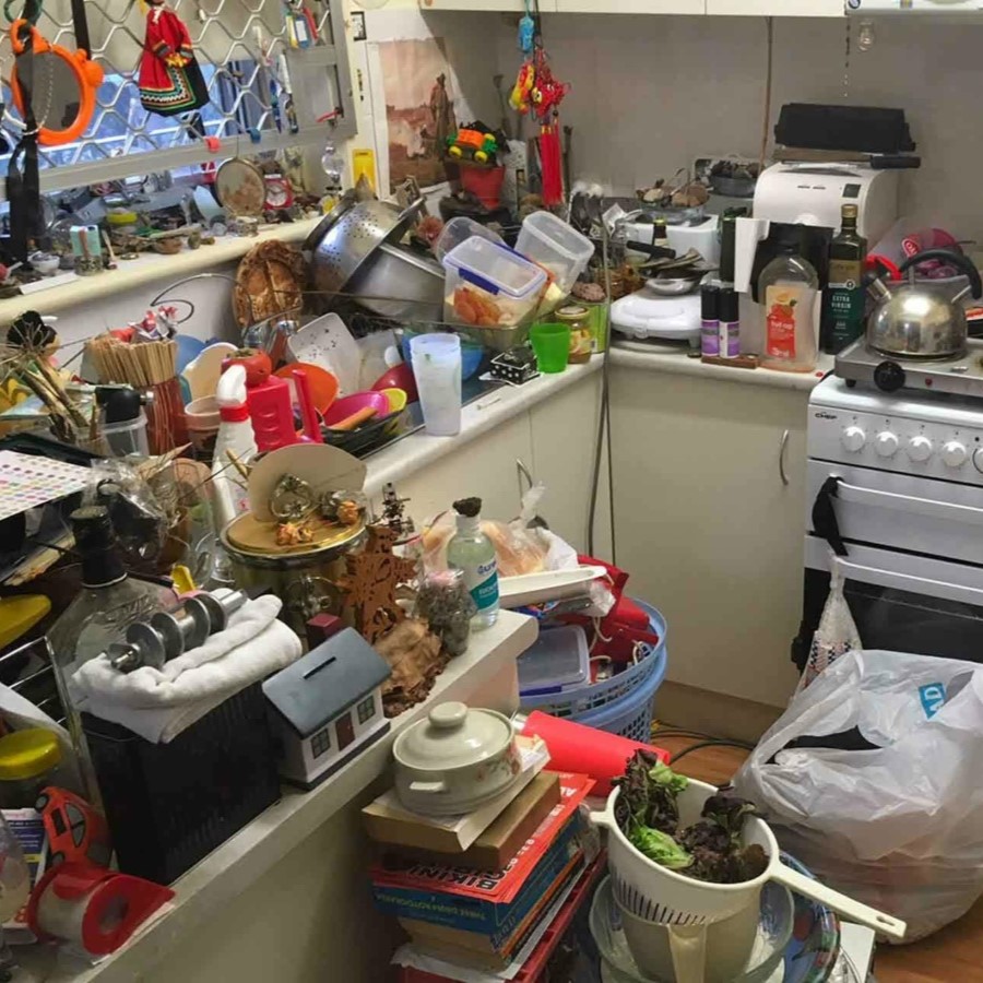 Cluttered kitchen before organizing