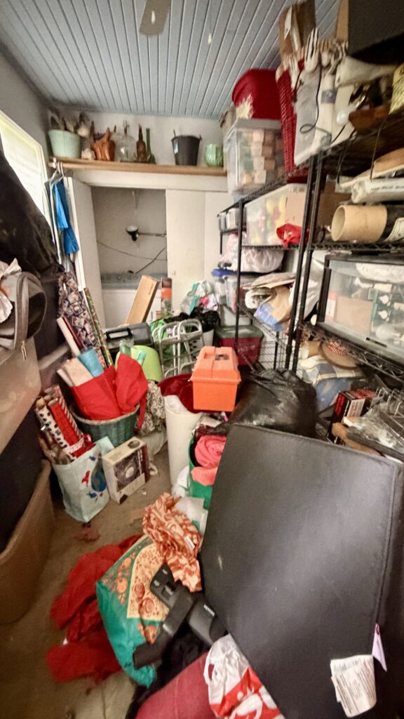 Cluttered storage room before organizing service in Heights Houston TX